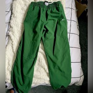 Forest green windbreaker pants